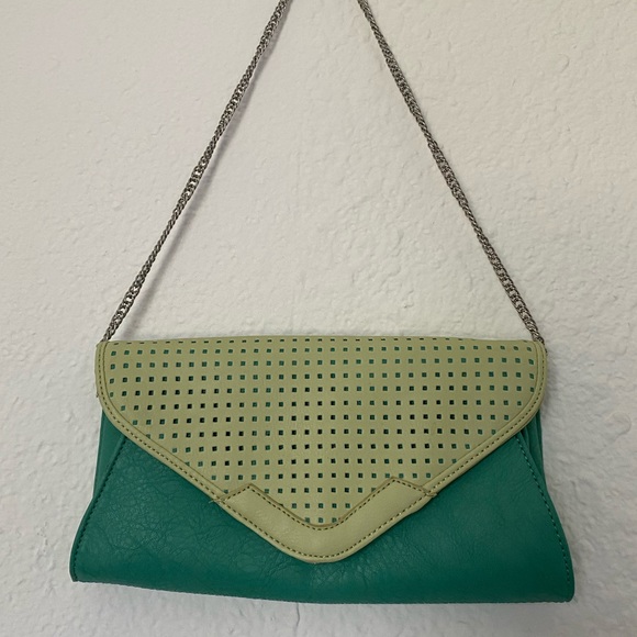 Pale pistachio and mint purse with silver strap.